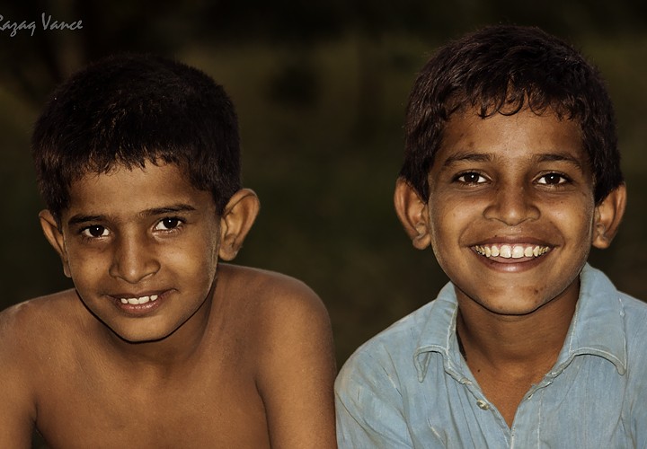Happy Smiling Faces Of Village Boys In Asia