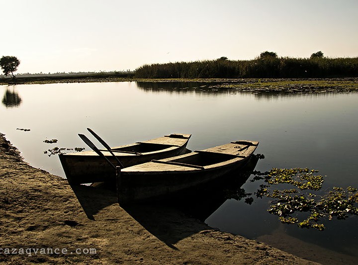 Parked Boats And Water Scape In The Evening Light