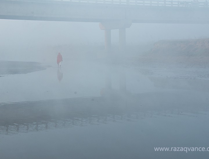 Life In A Mystic And Foggy Morning At River Ravi