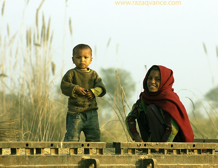 A Page From The Life Of Kids Near A River