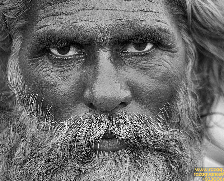 Portrait Of A Graceful Mystic Man From A Shrine in Punjab Pakistan